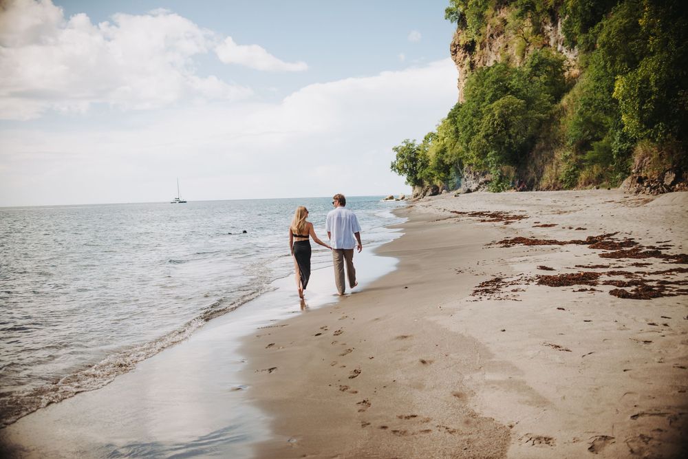 St Lucia Photographer captures surprise Proposal and engagement photoshoot at Anse Mamin Beach near Jade Mountain and Anse Chastenet Hotel