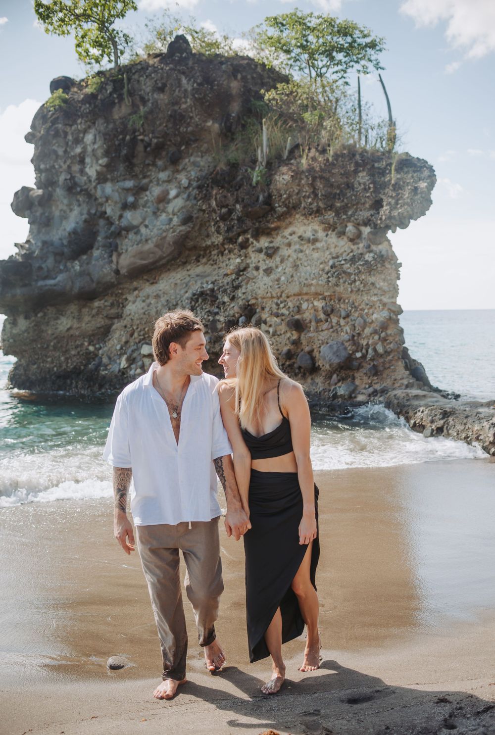 St Lucia Photographer captures surprise Proposal and engagement photoshoot at Anse Mamin Beach near Jade Mountain and Anse Chastenet Hotel