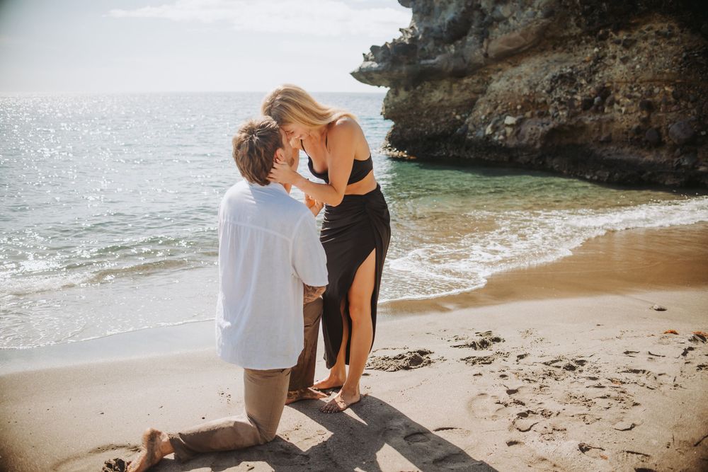 St Lucia Photographer captures surprise Proposal and engagement photoshoot at Anse Mamin Beach near Jade Mountain and Anse Chastenet Hotel