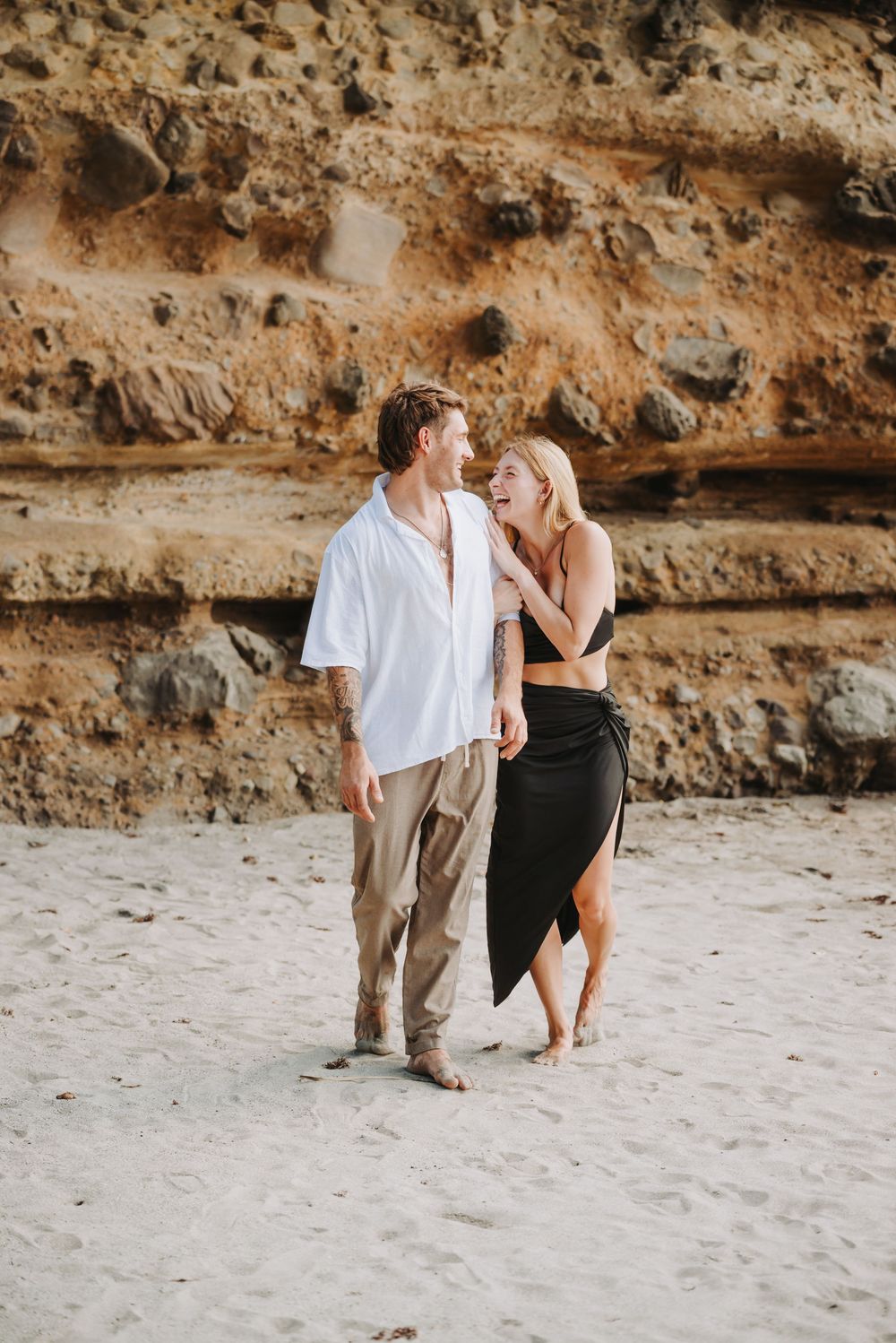 St Lucia Photographer captures surprise Proposal and engagement photoshoot at Anse Mamin Beach near Jade Mountain and Anse Chastenet Hotel