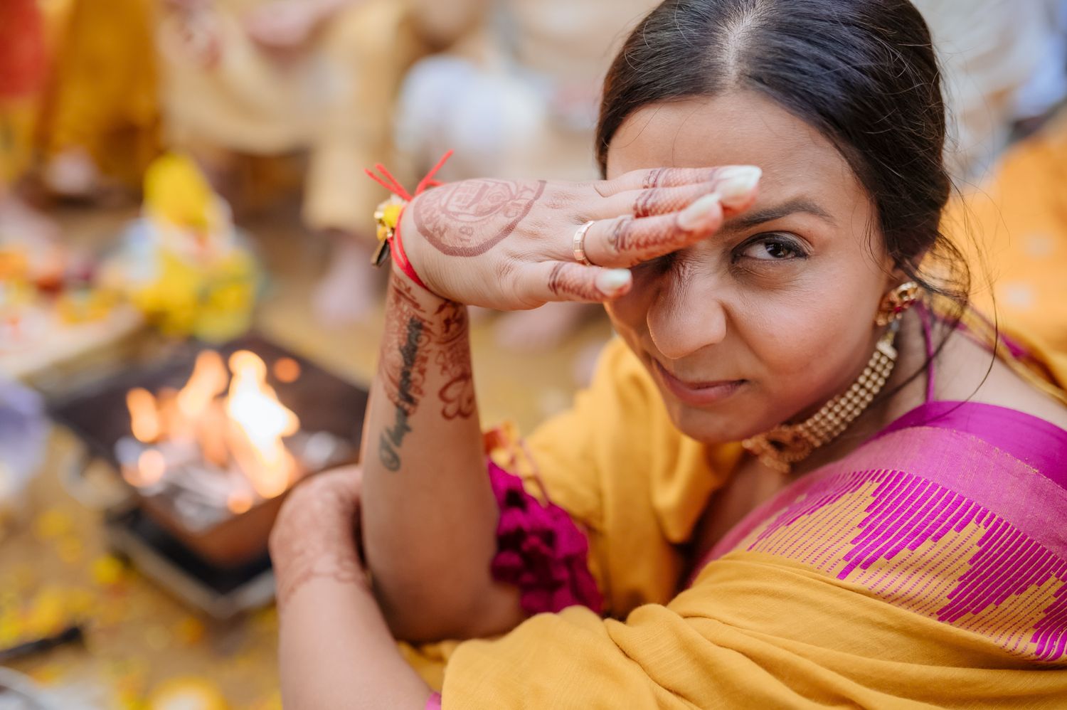 Bride Itisha during her intimate Chooda ceremony surrounded by family during her indo-norwegian wedding in Chandigarh