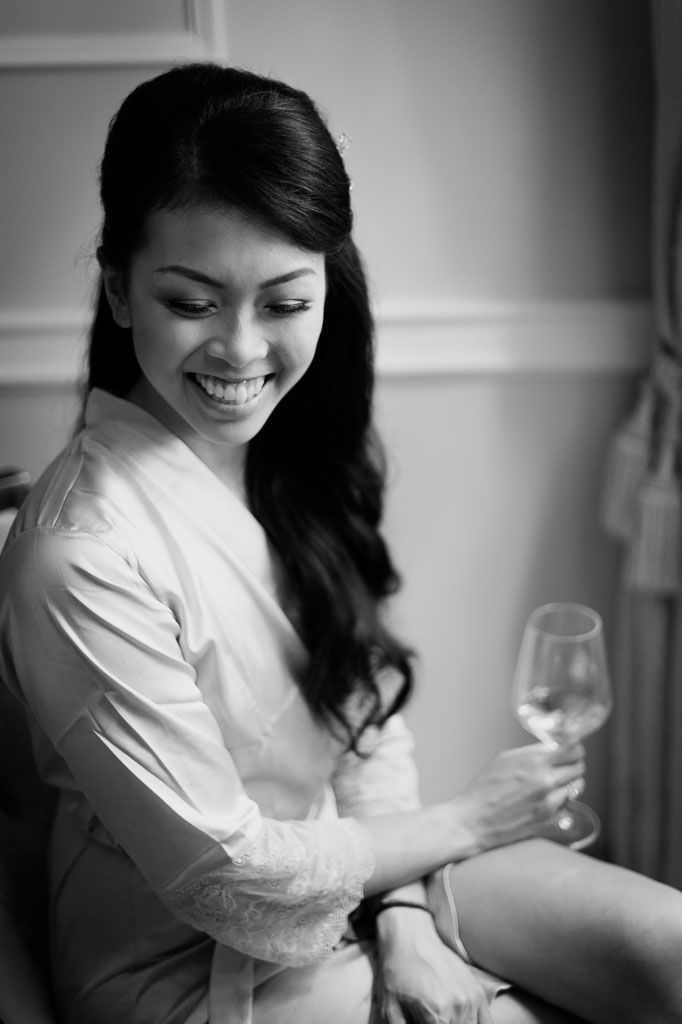 A series of black and white photos shows someone enjoying a quiet moment while dressed in a white blouse.