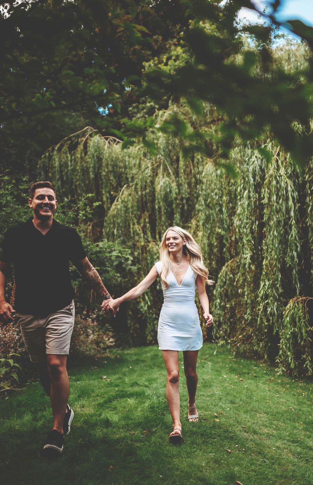 A playful sequence of movement photos showing people enjoying outdoor activities in a garden with willow trees.