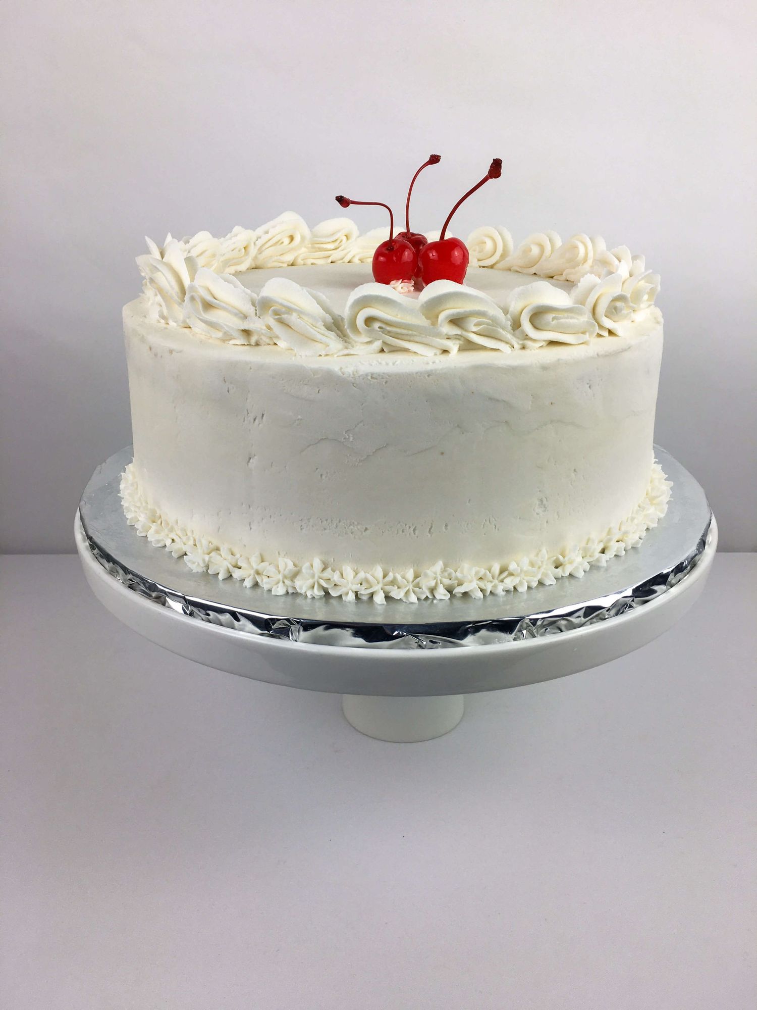 Flourish Bakery Howick – A classic yet elegant two layered cake, plush, soft and moist with a velvety vanilla butter cream frosting.