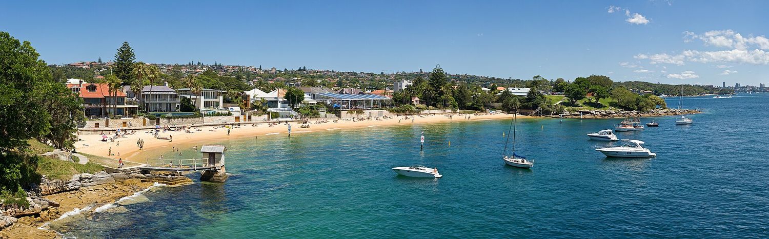 Calm water and boats at Camp Cove, Watsons Bay - relaxed beach engagement photo location in Sydney