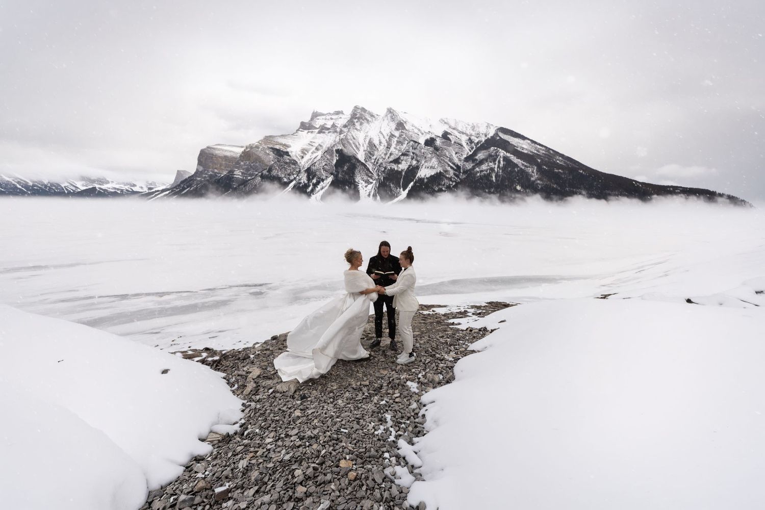 Winter elopement photography in the Canadian Rockies by Tkshotz