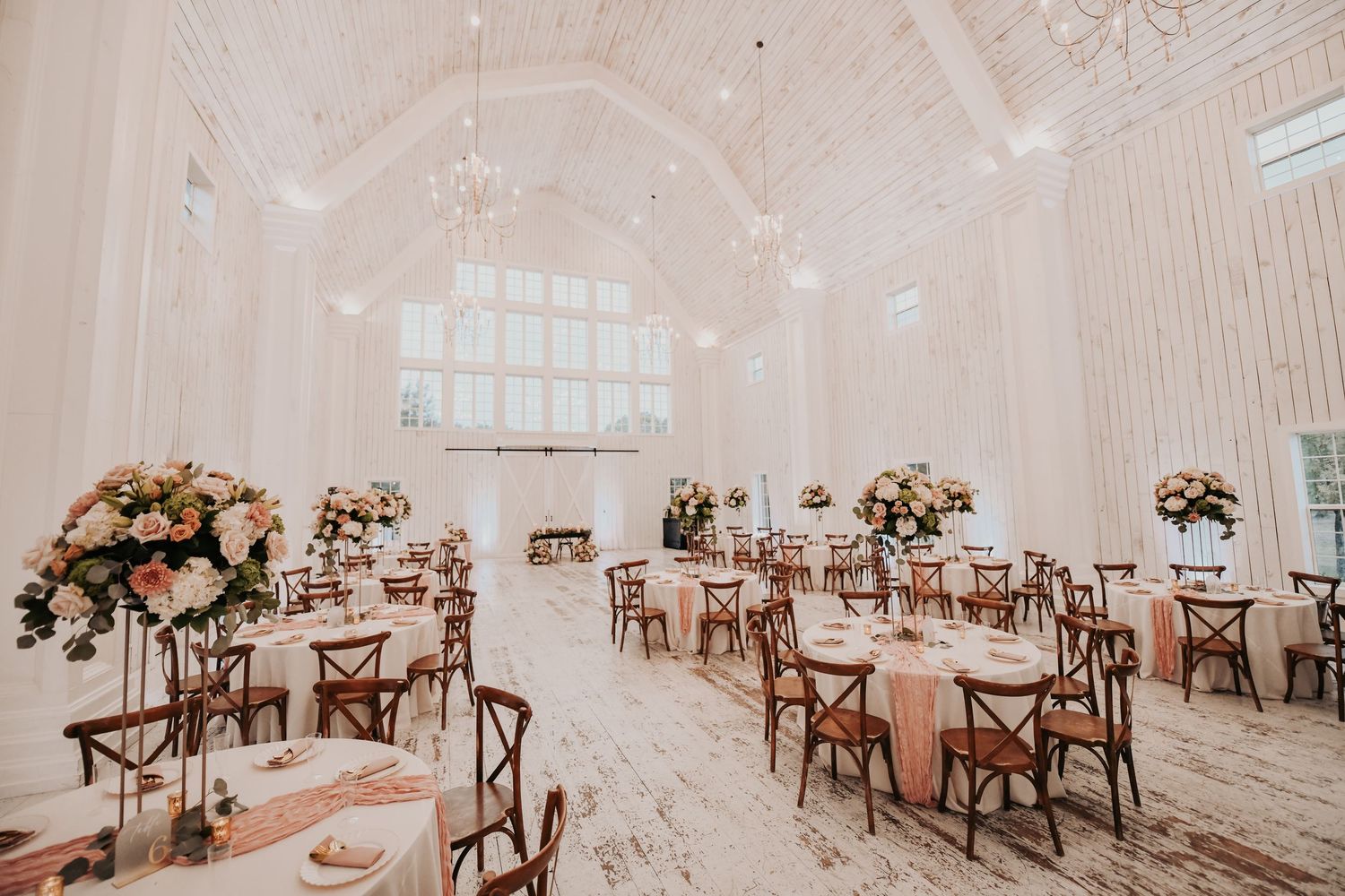 The White Sparrow reception hall decorated for an elegant romantic fall wedding