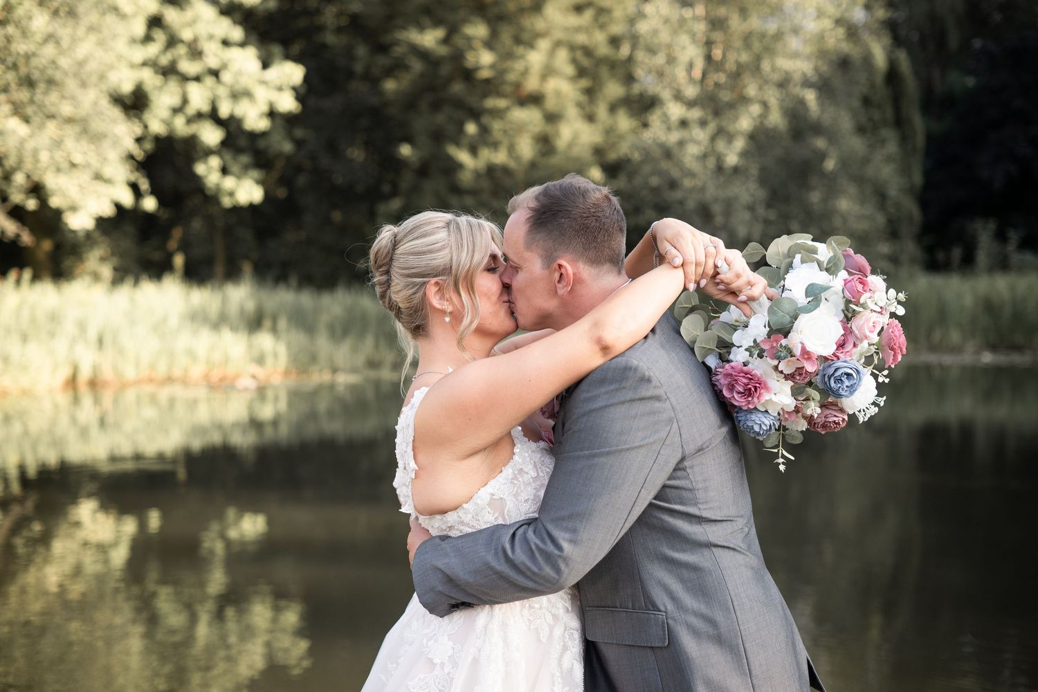 Megan and Tom at Moddershall Oaks by the stunning lake