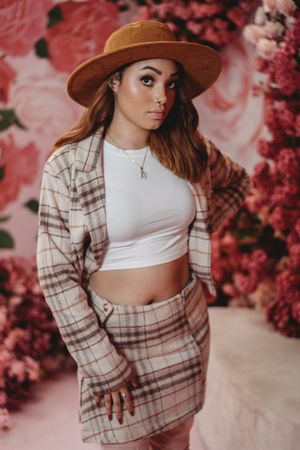 Fashion-inspired portrait featuring natural glam makeup and stylish editorial photography