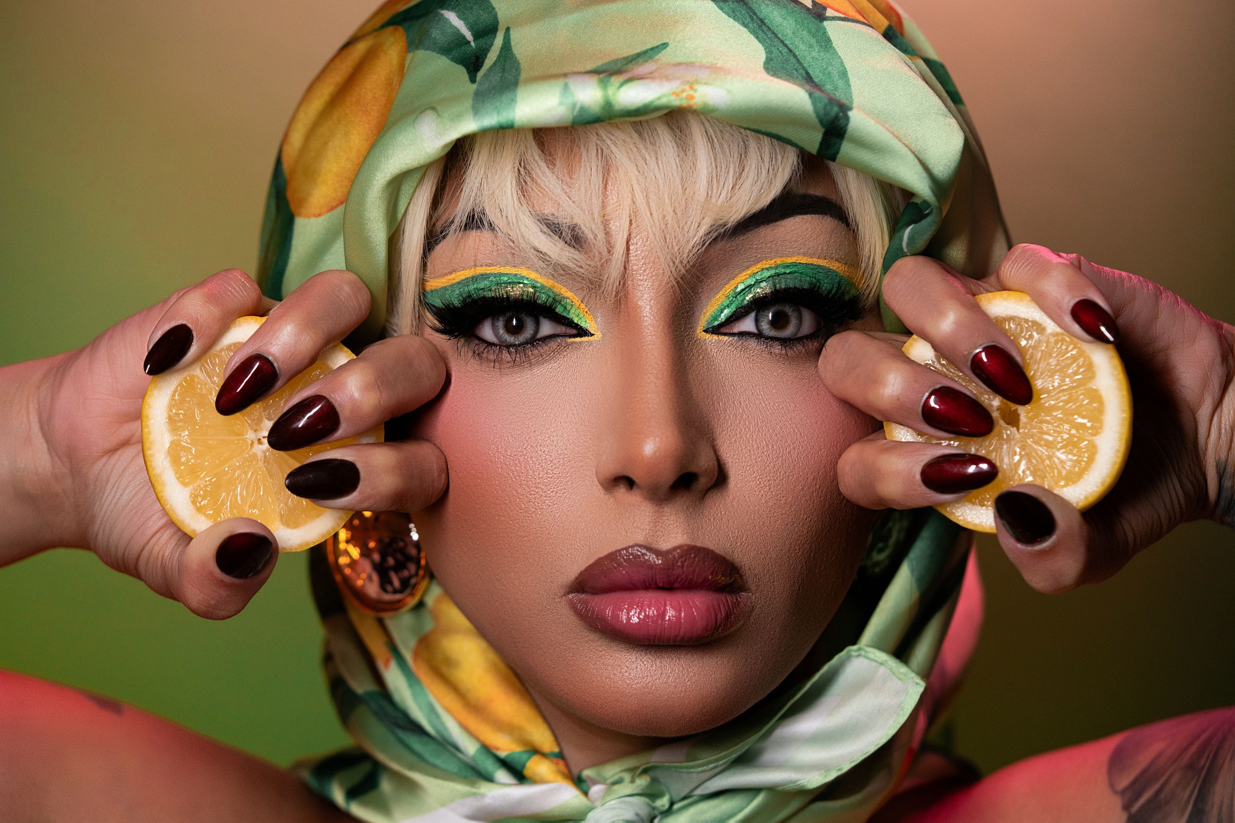 Creative editorial makeup featuring bold colors, artistic styling, and high-fashion beauty photography.