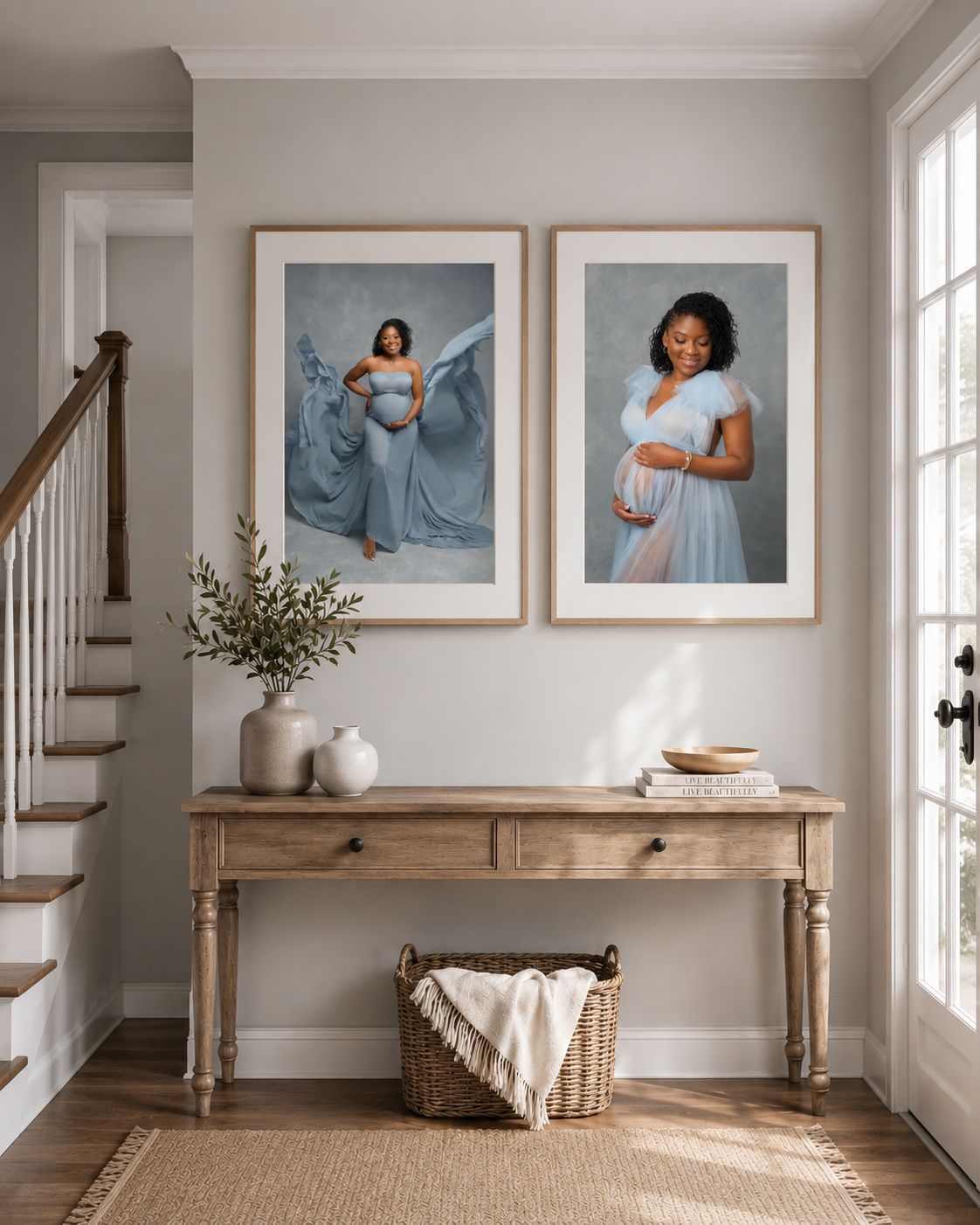 Custom framed maternity portraits displayed in a modern entryway gallery wall with natural light and neutral decor, photographed by a Tampa