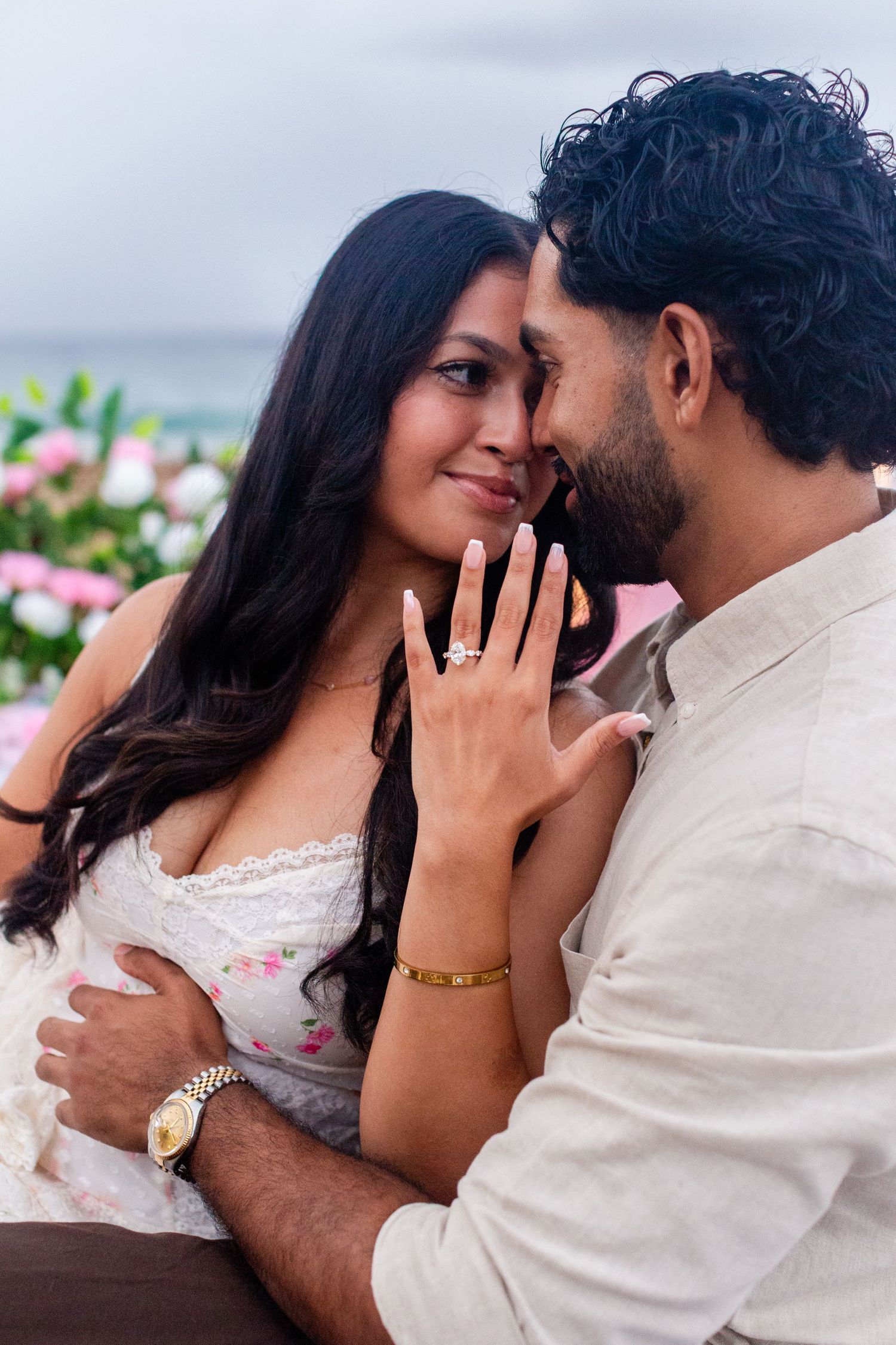Engagement portrait on the beach. Man and woman showing off the ring. Playa Guajataca, Isabela, Puerto Rico.