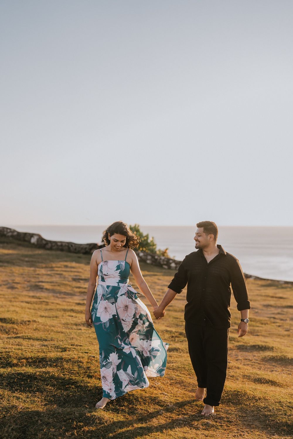 Sunset couple photography session at Balangan Beach with ocean backdrop.