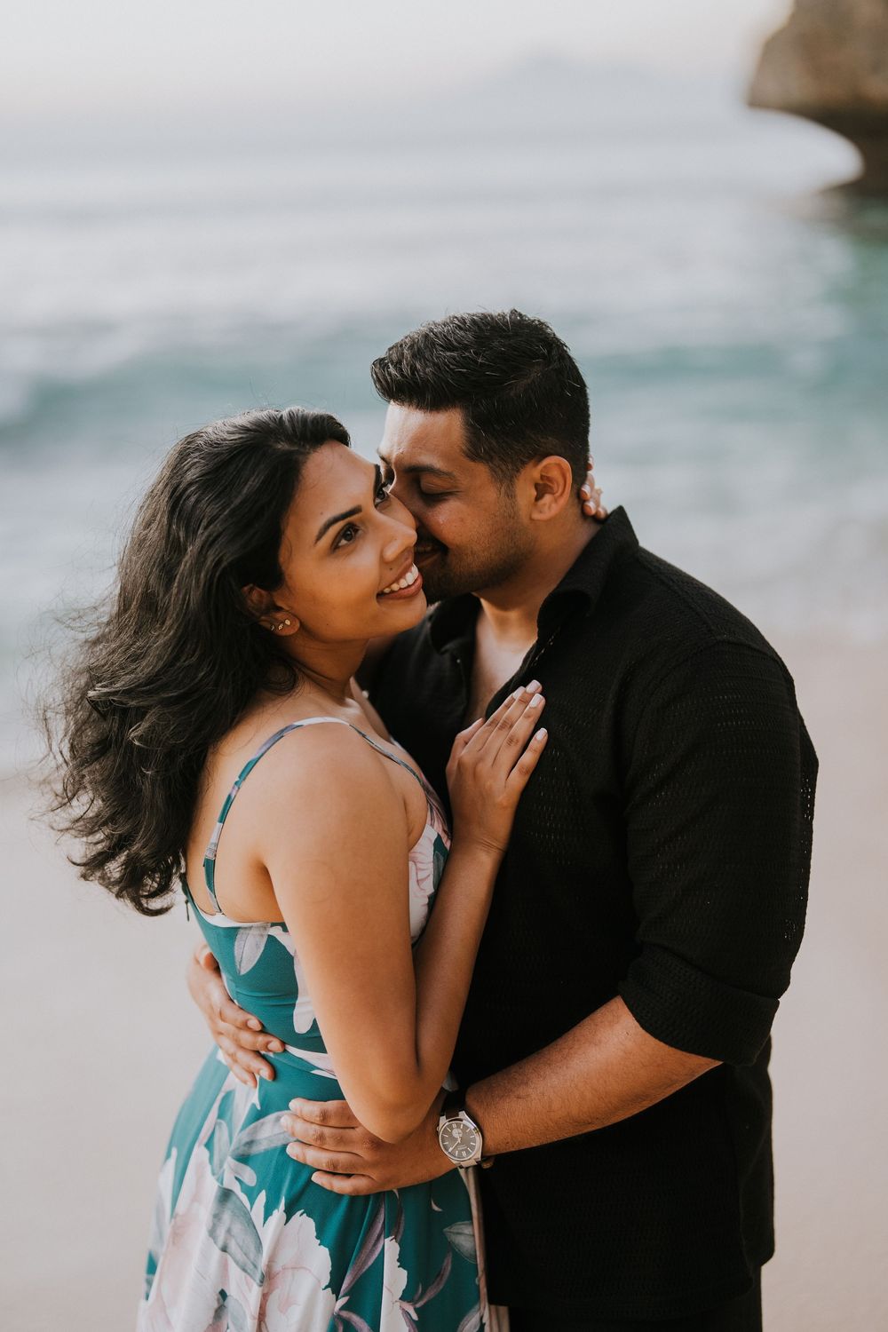 Sunset couple photography session at Balangan Beach with ocean backdrop.