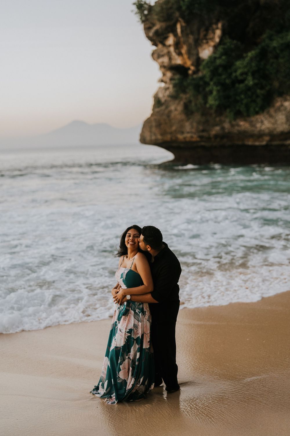 Sunset couple photography session at Balangan Beach with ocean backdrop.