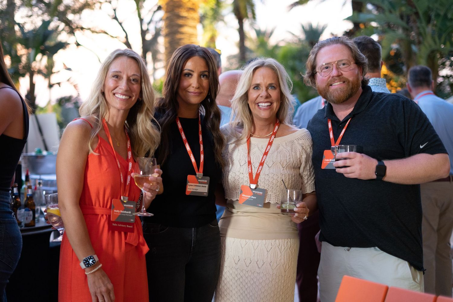 Orlando event photographer — professionals networking at corporate conference with event badges