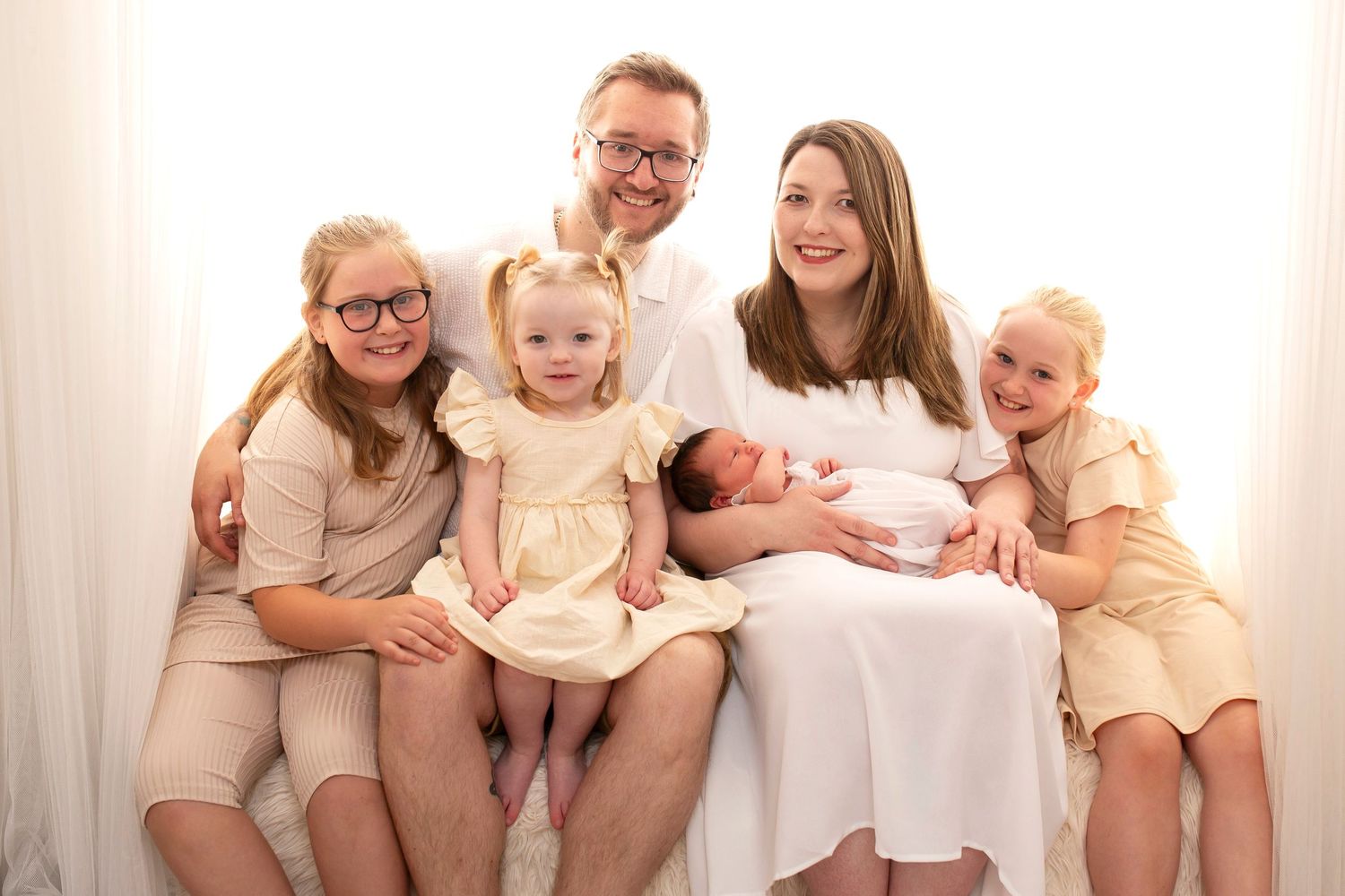 family photoshoot with new baby at little wonderland photography widnes cheshire