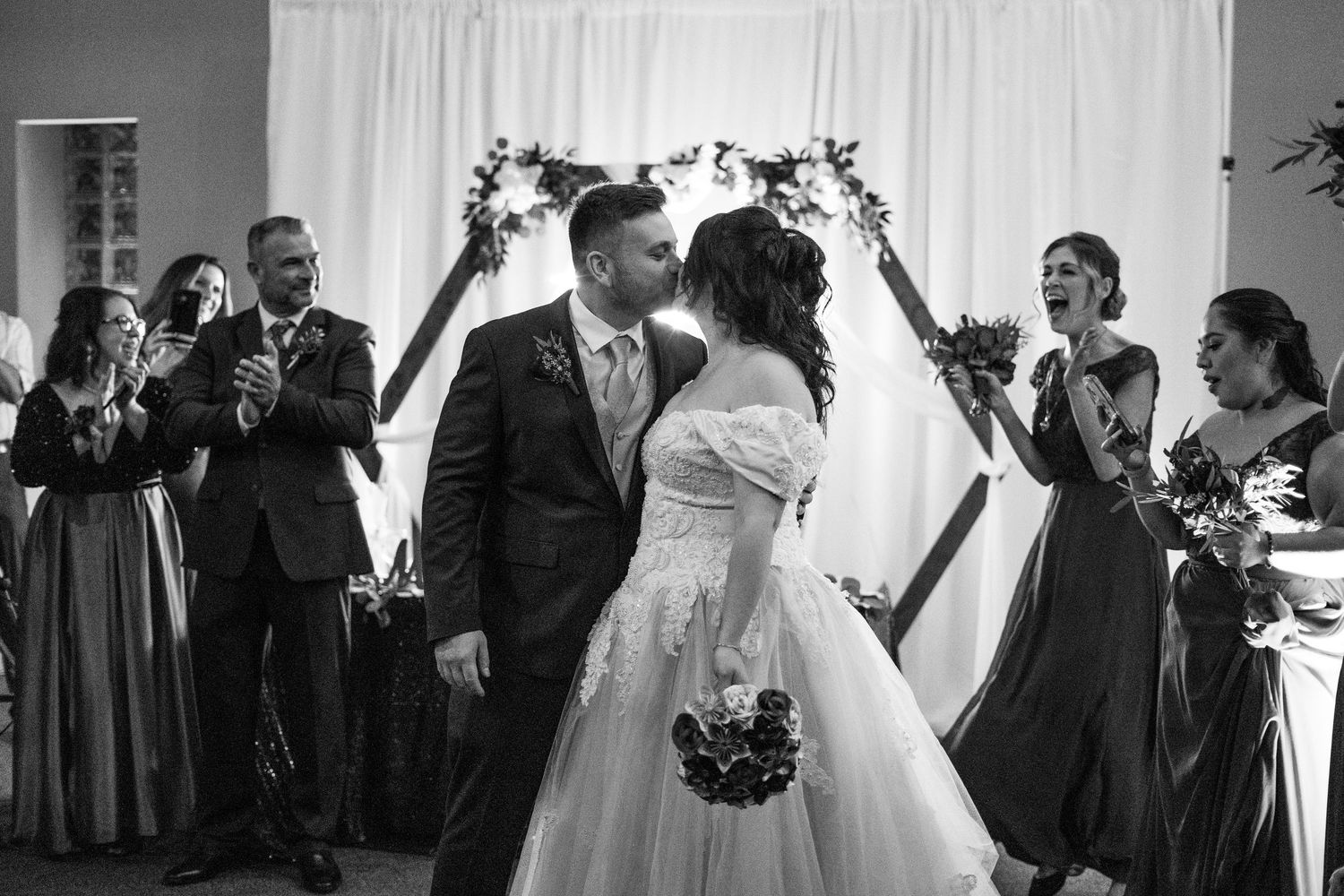 Channel Side Club in Palm Coast Florida. Wedding photography of elegant wedding reception. Couple has first dance.