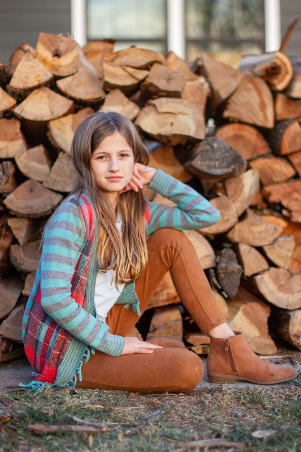 a tween girl during a fall family session in Manila Arkansas