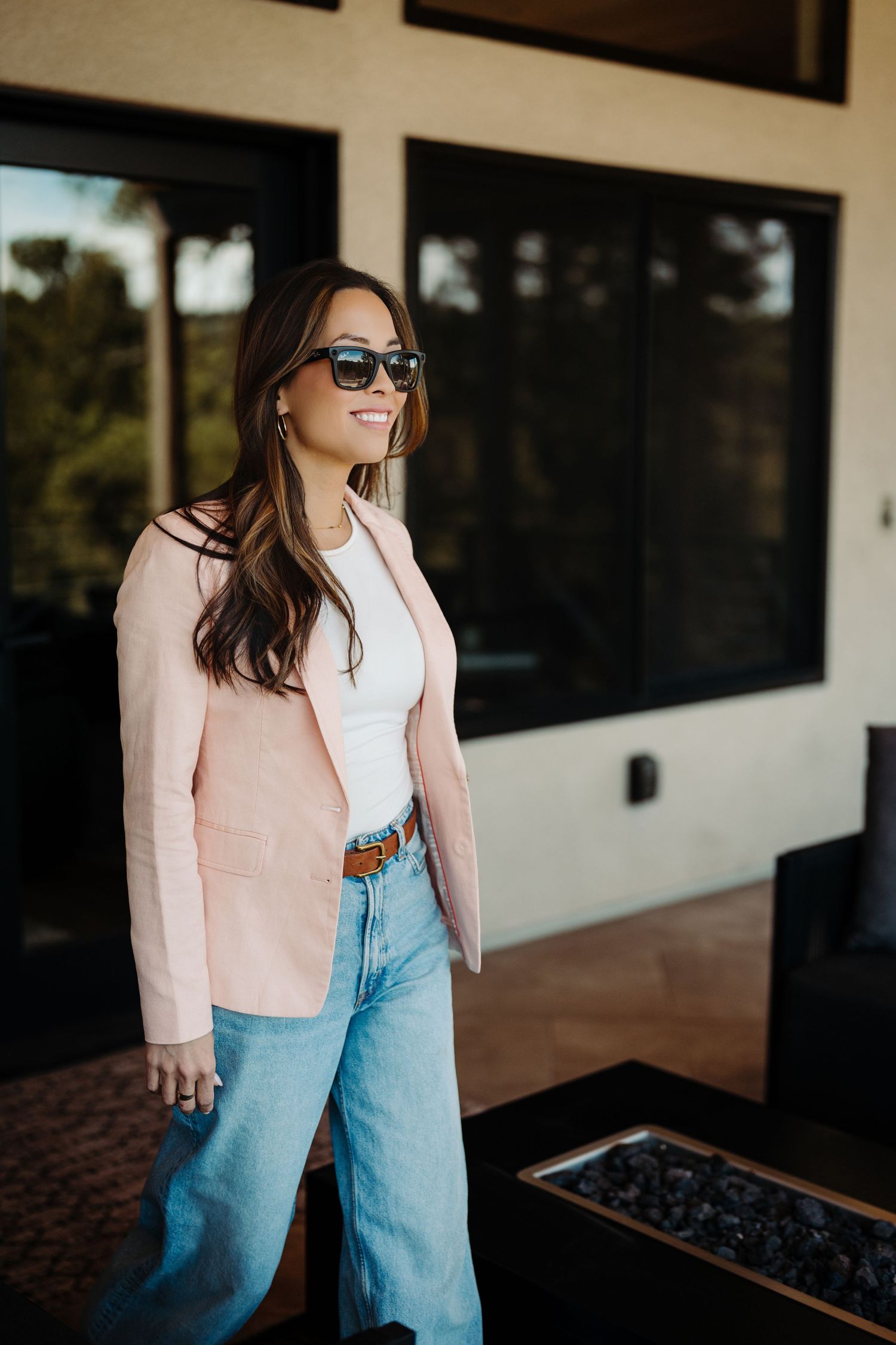 Real estate agent walking through a modern home during a Mini Branding photoshoot