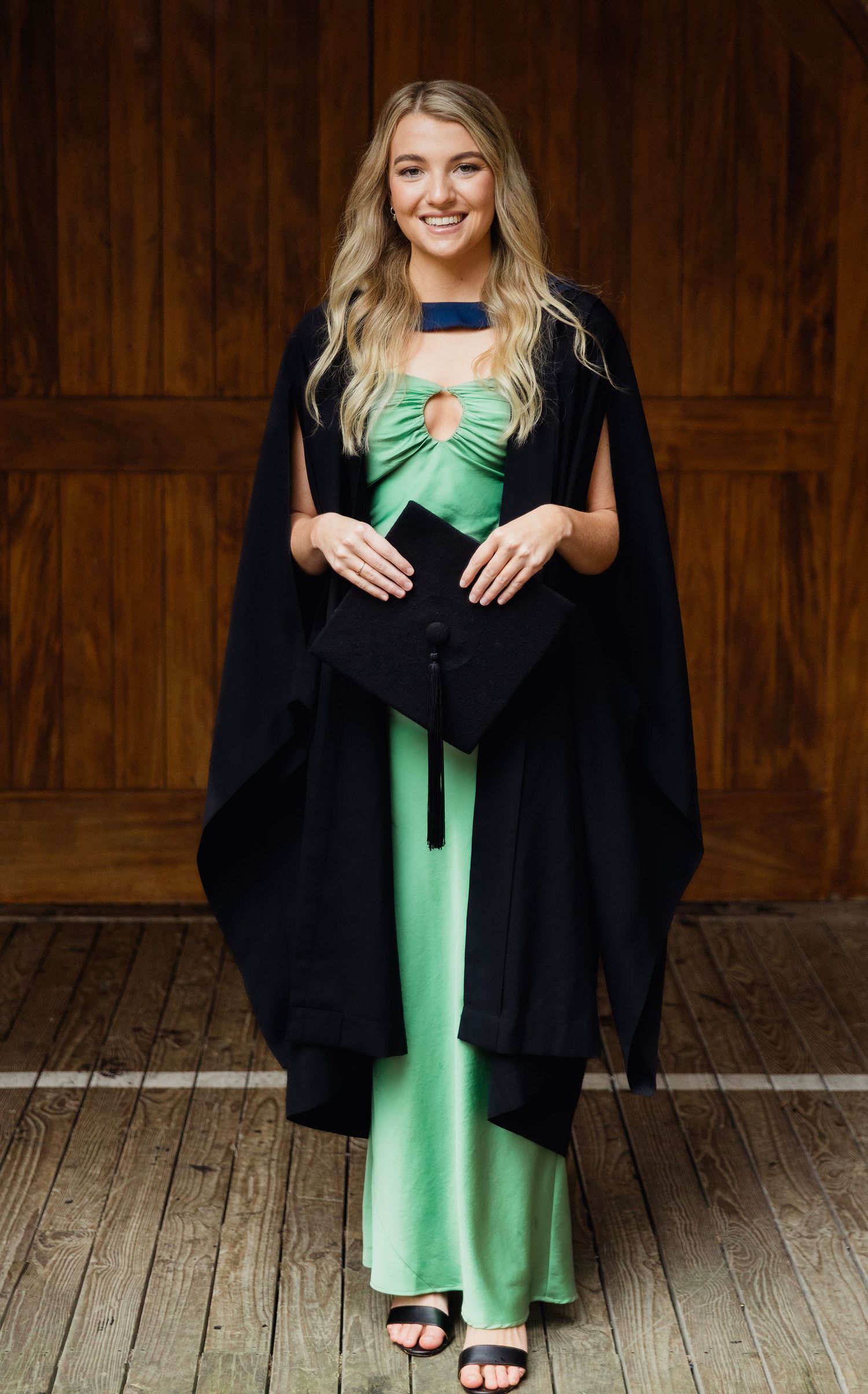 Auckland graduation photography of a university graduate in cap and gown