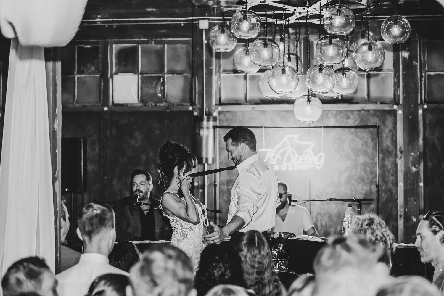 Action photo of Megan and Joel performing their wedding dance