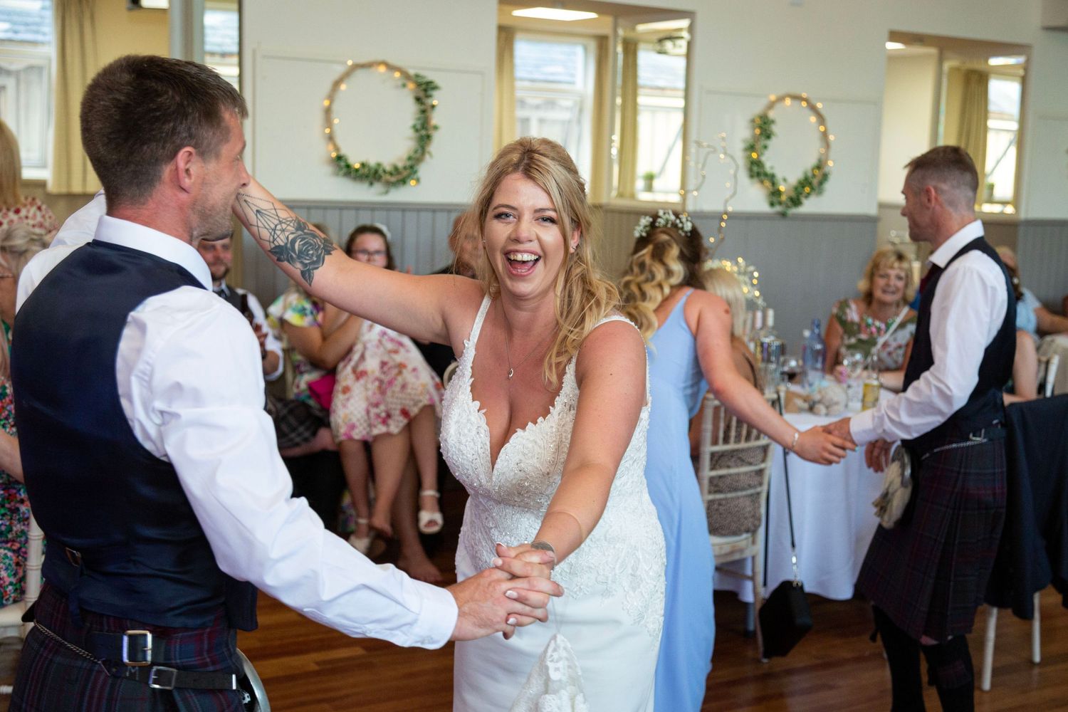 Bride and groom having a great time on the dance floor