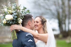 Bride and groom with flowers n their wedding day