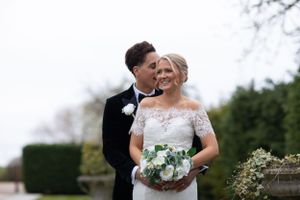 couple laughing at friern manor on their wedding day