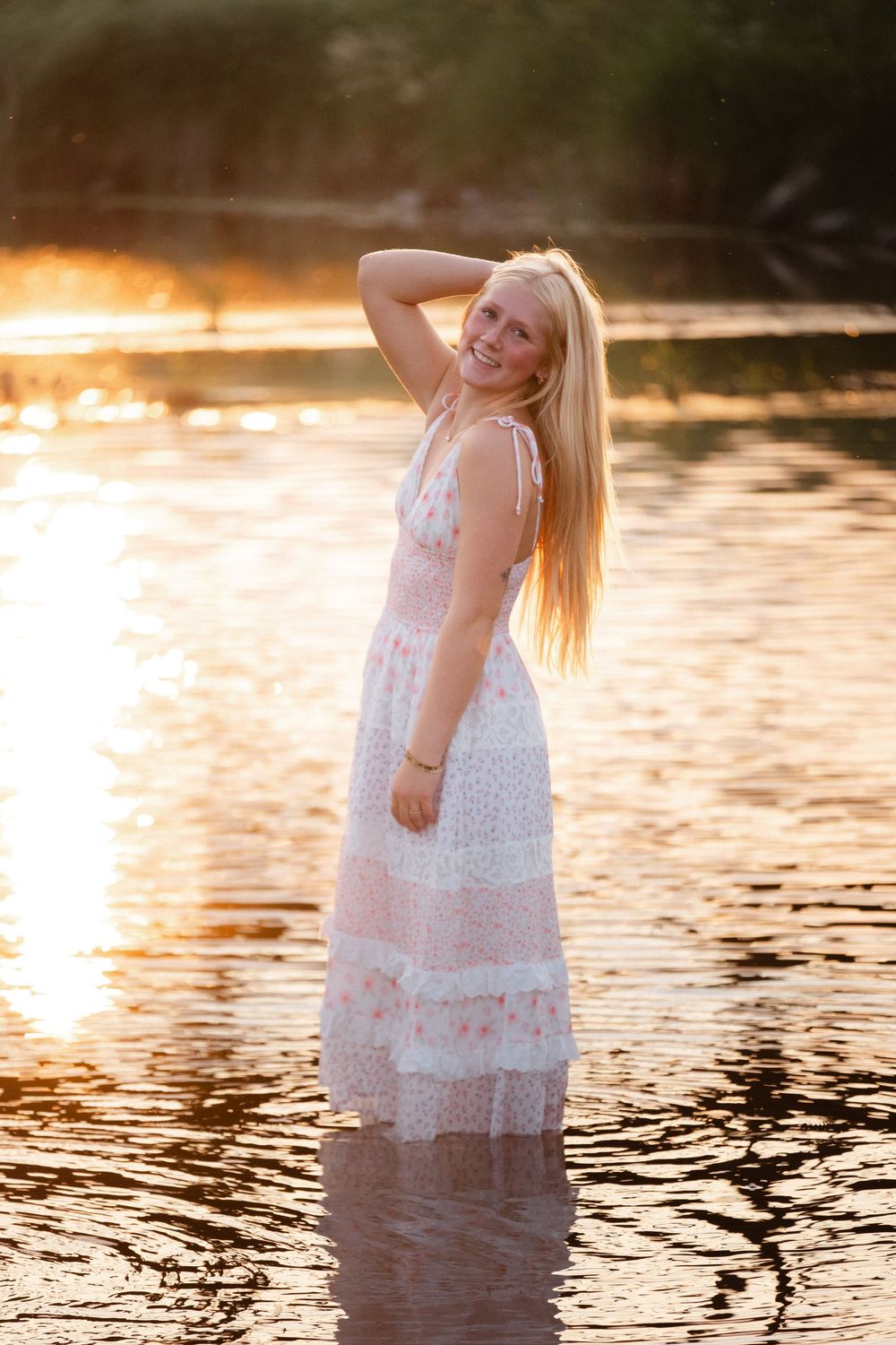 Ella senior portrait session in wildflowers in North Dakota by GMB Photo and Design