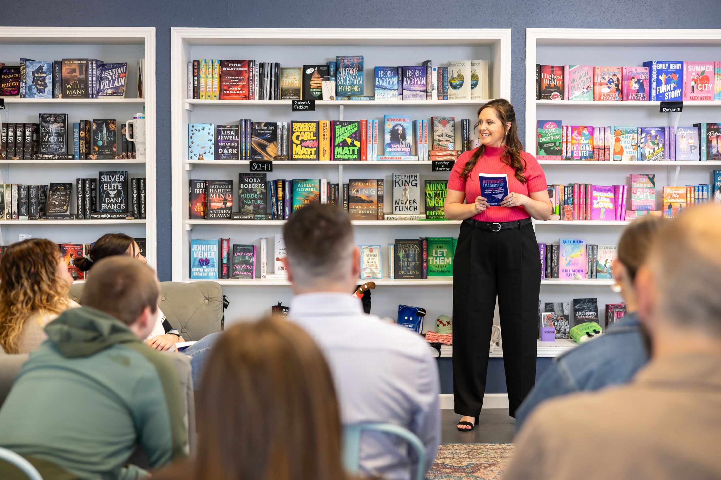 self published author Melissa Castro book signing event in Seattle, WA author standing in front of readers talking answering questions