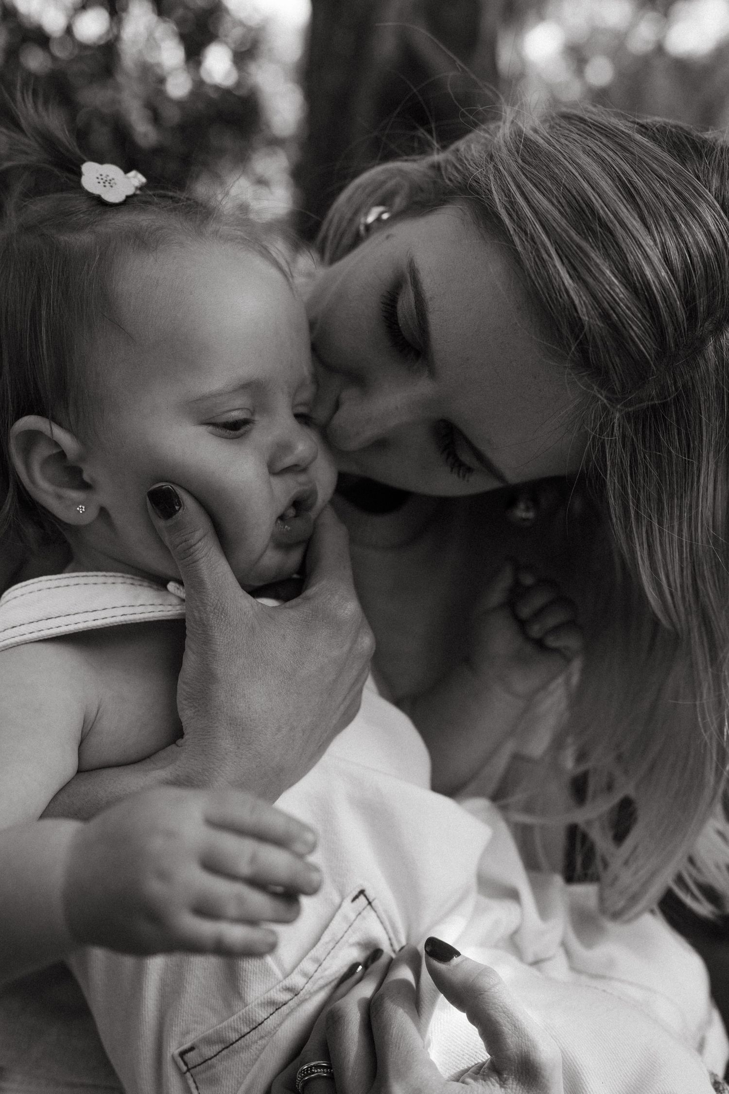 Black and white series capturing intimate moments between parent and child.
