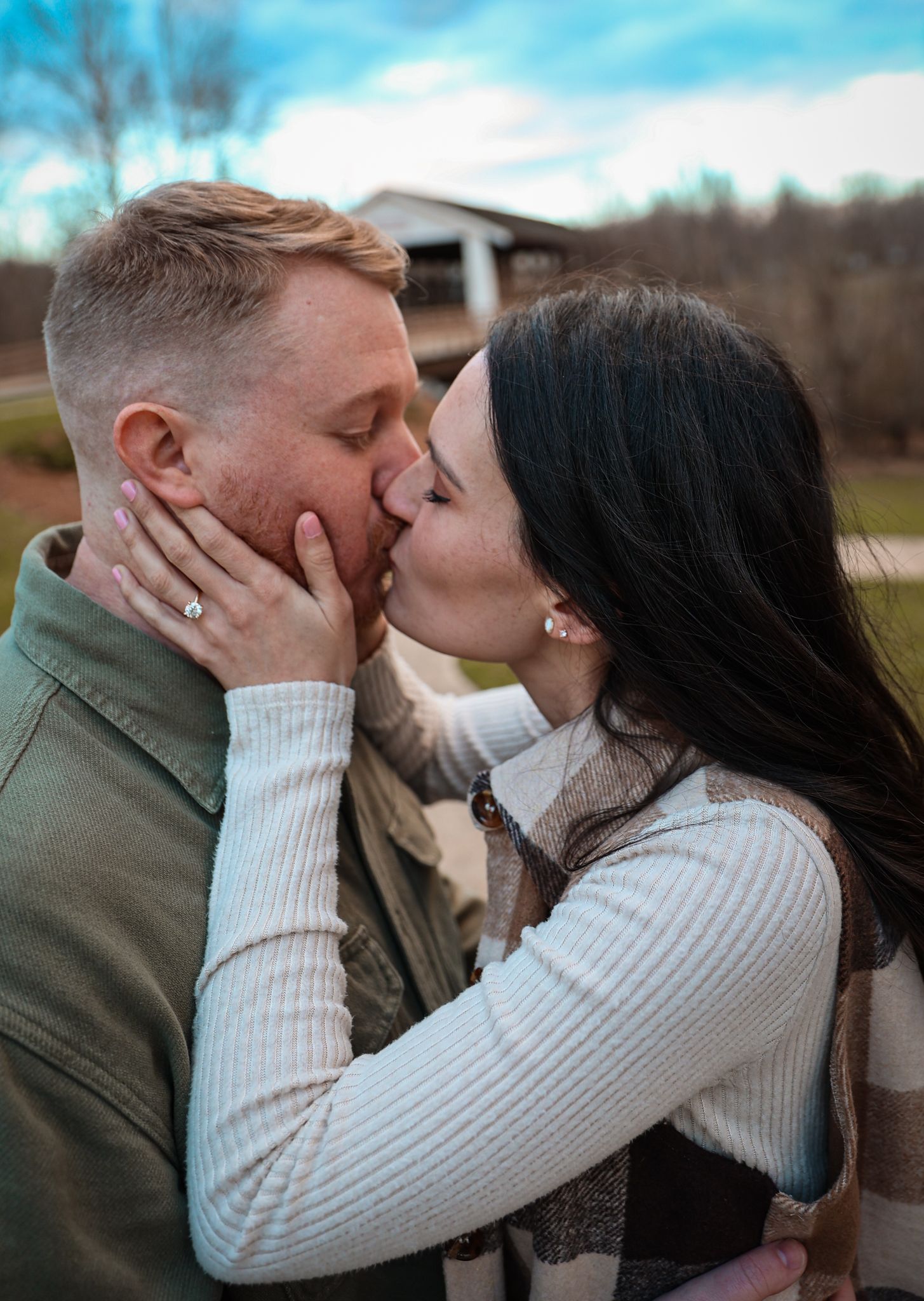 Intimate engagement photo series captured in natural outdoor winter setting.