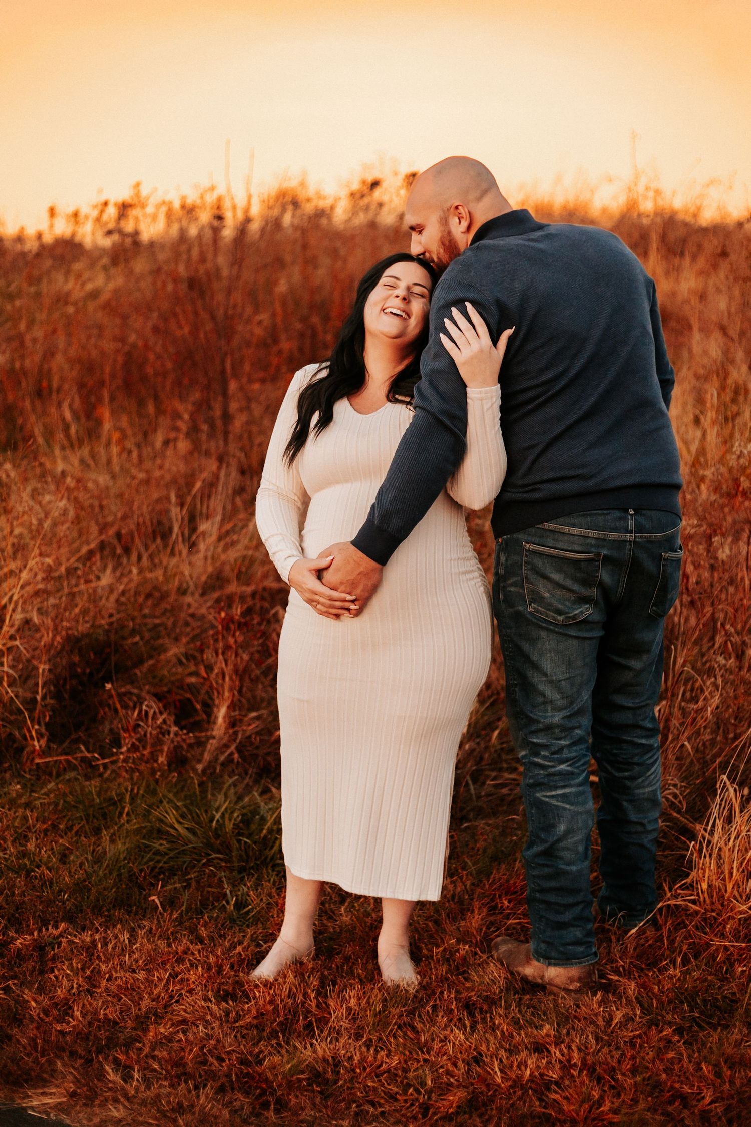 Intimate close-up portrait of couple sharing romantic moment outdoors.