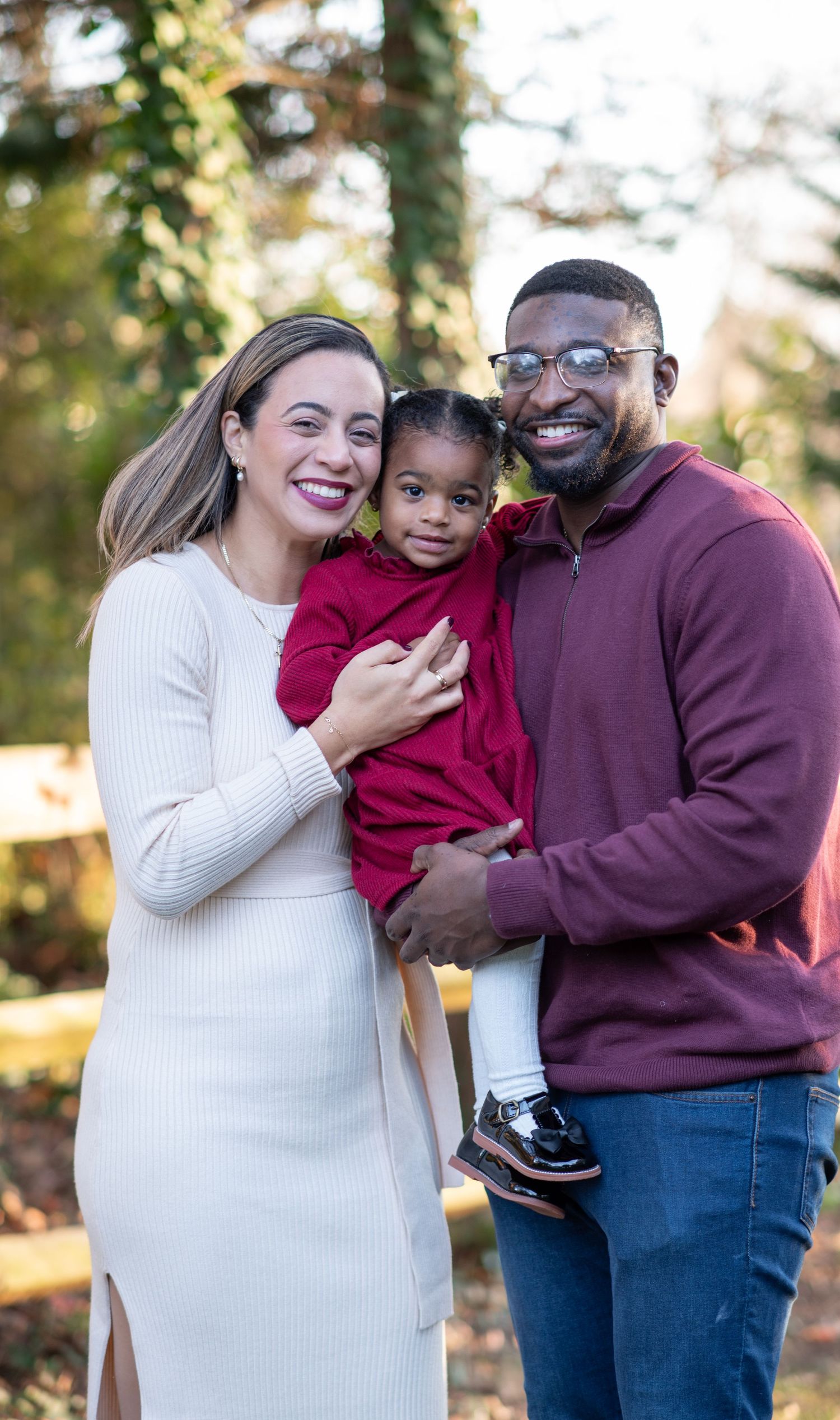 Loving Family Portrait of a black family by a DMV Black Female Photographer in Prince George's County, MD