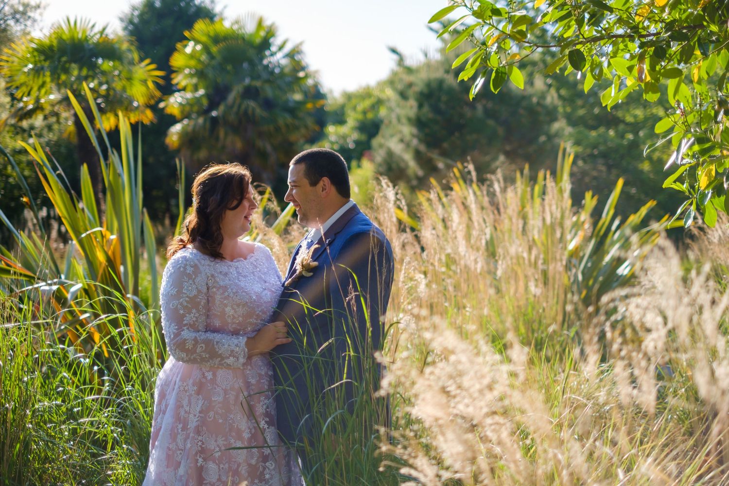 Bride and groom at golden hour in the grounds of Chester Zoo