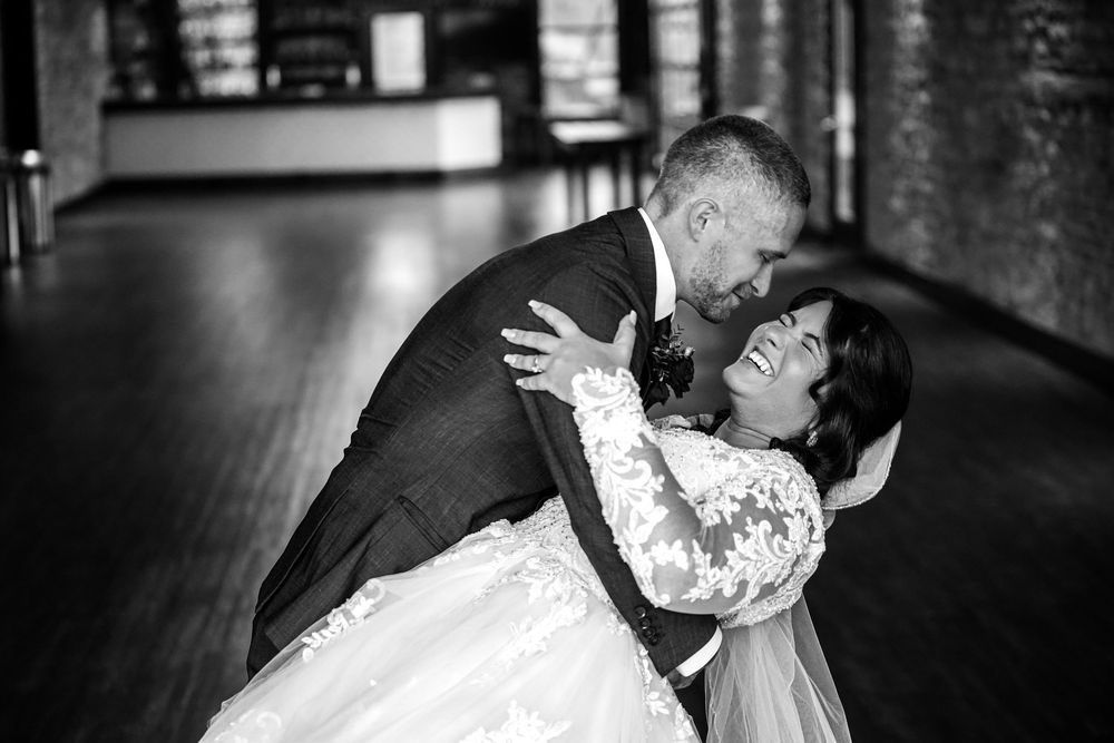 A series of candid wedding photos capturing intimate moments between a couple in a rustic venue.