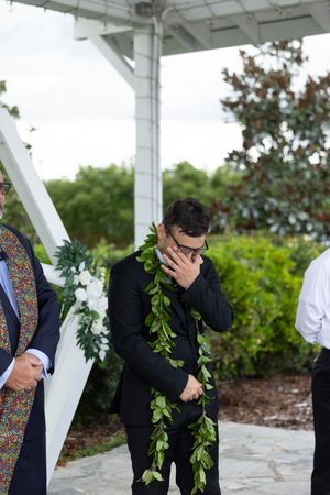 An emotional moment during a wedding ceremony as an Orlando luxury wedding photographer