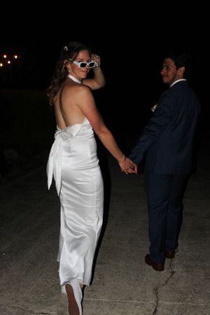 Orlando luxury wedding photographer takes photos of the bride and groom for a flash session.