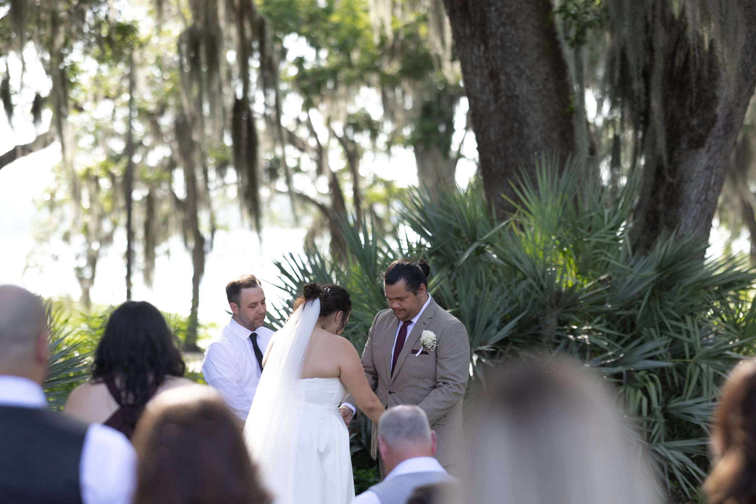 Orlando luxury wedding photographer bride and groom at the altar.