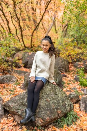 Girl sitting on a rock near Neff's canyon.