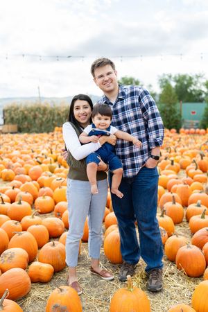 Family at a pumpkin patch.