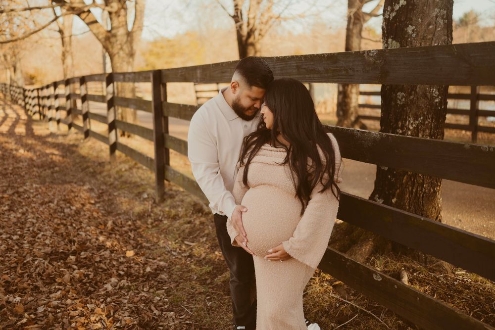 Couple embraces during maternity photos in Franklin, TN with Disney Magic Photography, Nashville and Clarksville newborn photographer