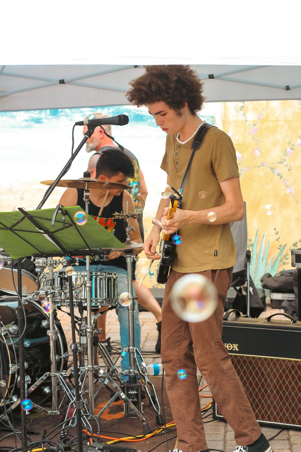 Dalton Truitt Plays the Guitar on Deborn Street in Englewood Florida.