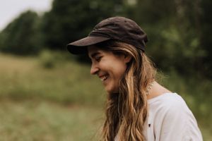 Film still of film director Mishka Balilty laughing. Photo by Samantha Bateman.