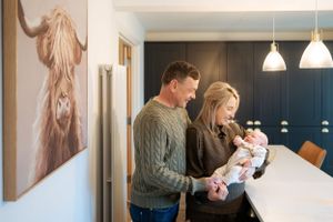 A modern home interior with soft lighting and decorative wall art.