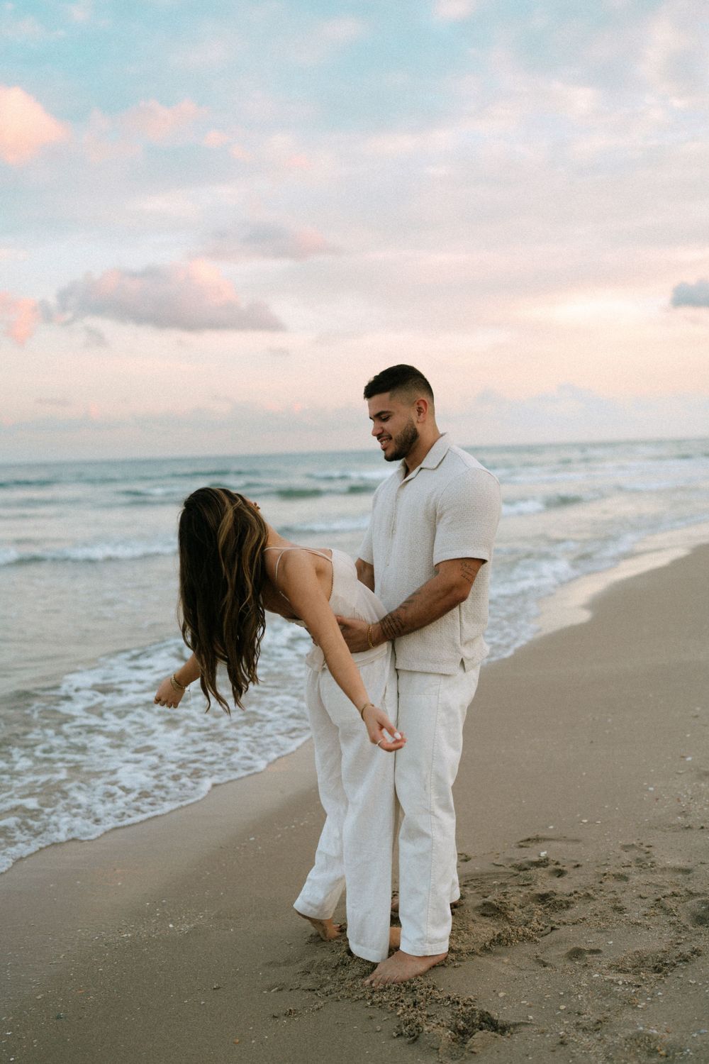 Fun at the beach celebrating love and an engagement.