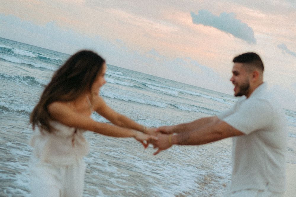 Fun at the beach celebrating love and an engagement.