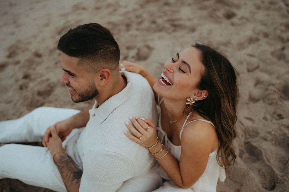 Fun at the beach celebrating love and an engagement.