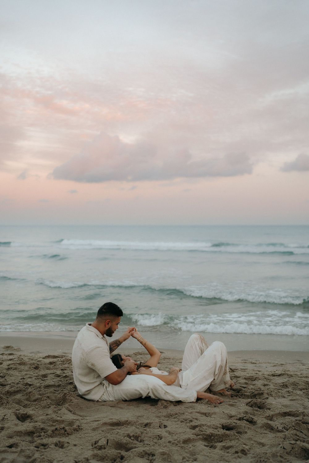 Fun at the beach celebrating love and an engagement.